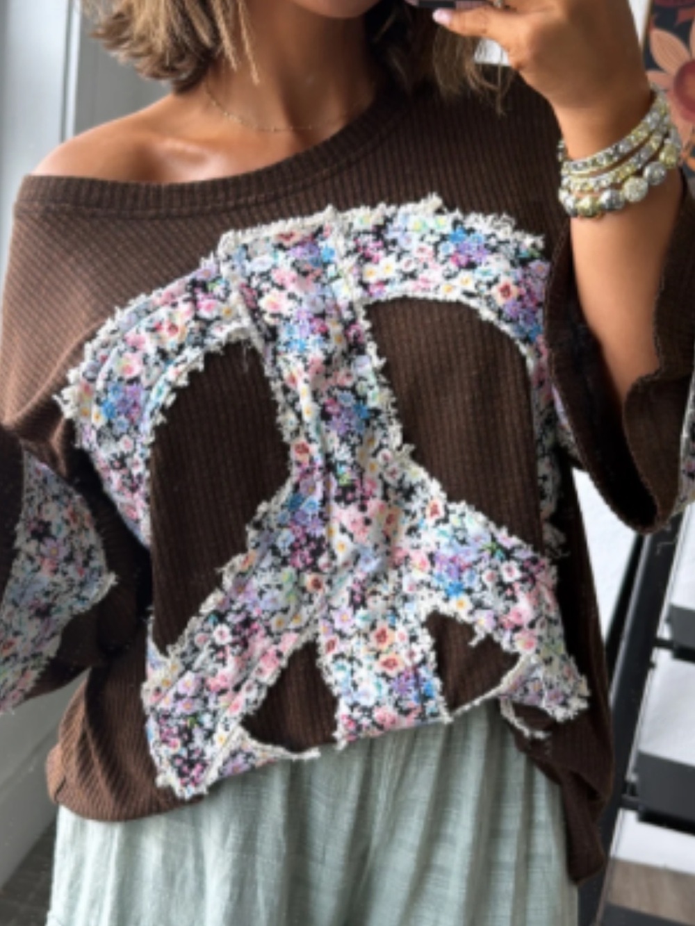 POL Brown Off-Shoulder Sweater with Floral Peace Sign
